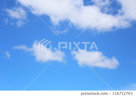 Blue sky with white clouds in the daytime background. 116752763