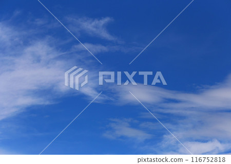 Blue sky with white clouds in the daytime background. 116752818