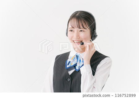 穿著辦公室衣服、戴著耳機的女人 116752899