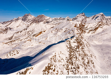 Winter alpine landscape near Zermatt with snow covered mountains, Switzerland Winter alpine landscape near Zermatt with snow covered mountains, Switzerland 116753203