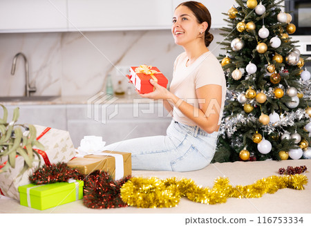 prepearing for New Year and preparing surprises, girl picked up most beautiful gift 116753334