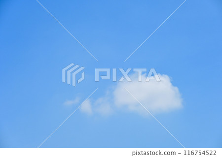 beautiful blue sky and white fluffy single cloud with sunrise in the morning, natural background 116754522