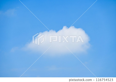 beautiful blue sky and white fluffy single cloud with sunrise in the morning, natural background 116754523