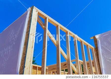 Frame for support beam unfinished interior timber during construction of new home 116755537