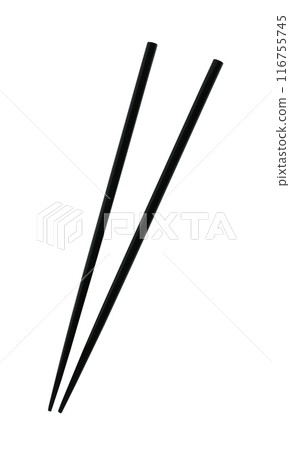Wooden chopsticks are used as eating utensils. Wooden chopsticks are used as eating utensils. 116755745