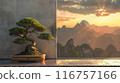 A small bonsai tree sits on a wooden stand in front of a window 116757166