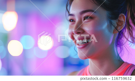 Smiling woman happily exercising 116759632