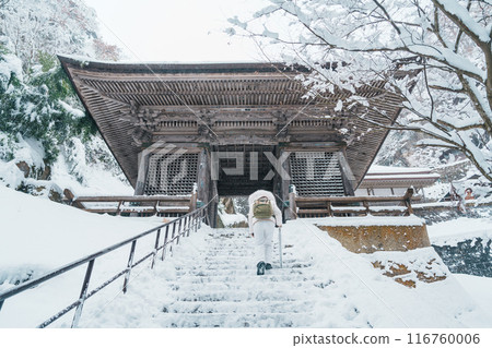 Woman tourist sightseeing Yamadera temple with snow in winter, traveler travel Risshakuji temple in Yamagata City, in Yamagata Prefecture, Tohuku, Japan. Landmark for tourists attraction in Japan Woman tourist sightseeing Yamadera temple with snow in winter, traveler travel Risshakuji temple in Yamagata City, in Yamagata Prefecture, Tohuku, Japan. Landmark for tourists attraction in Japan 116760006