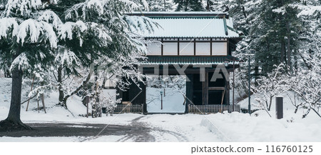 Hirosaki Castle gate or Takaoka Castle entrance with snow in winter, Japanese castle located in Hirosaki city, Aomori Prefecture, Tohoku, Japan. Landmark for tourist attraction. Japan travel 116760125