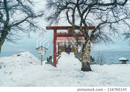 Kansa Shrine and Lake Tazawa with snow in winter season. located in Semboku city, Akita Prefecture, northern Japan. Landmark and famous for tourists attractions in Tohoku region, Japan 116760145