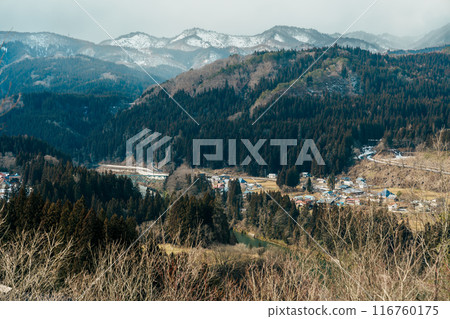 Panoramic View of Japan local train with Tadami river and bridge. Tadami Railway Line in The Valley at Mishima Machi, Aizu, Fukushima Prefecture, Japan. Landmark and iconic spot for tourist attraction 116760175