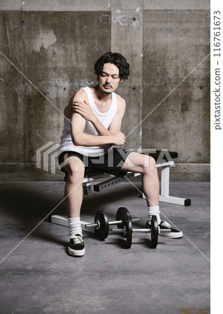 young man training in the gym 116761673