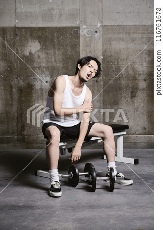 young man training in the gym 116761678