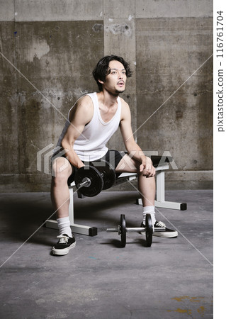 young man training in the gym 116761704