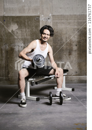 young man training in the gym 116761737