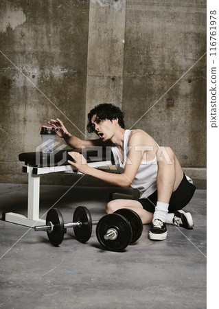 young man training in the gym 116761978
