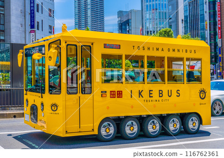 Tokyo cityscape in Japan, with a view of the yellow Ikebus that brings happiness, etc. - June 12th, east exit of Ikebukuro Station 116762361