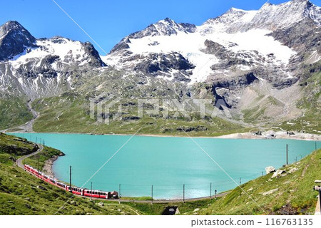 Glaciers can be seen from the Bernina train. This is the Cambrena Glacier. Glaciers can be seen from the Bernina train. This is the Cambrena Glacier. 116763135