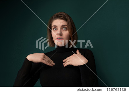Woman in Black Shirt Making Funny Face 116763186