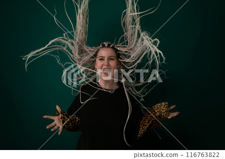 Woman With Hair Flying Through the Air Woman With Hair Flying Through the Air 116763822