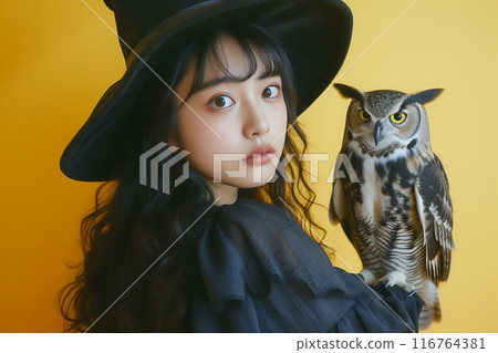 Woman dressed as a witch and an owl - AI-generated image 116764381