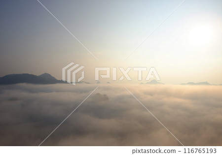 Beautiful Sunset and sunrise on sky and golden twilight time with mist and fog in valley of layer mountain 116765193