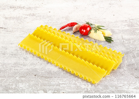 Uncooked raw Lasagna dry sheets Uncooked raw Lasagna dry sheets 116765664