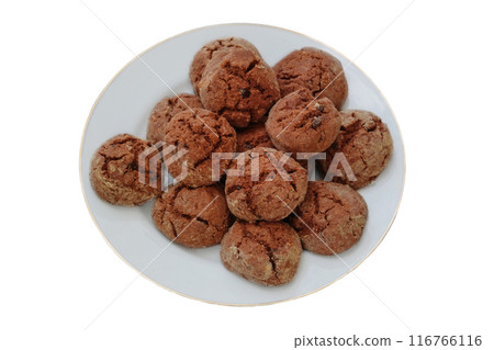 Sweet cakes in ceramic plate isolated on a white background. Chocolate romantic biscuit. Top view. Sweet cakes in ceramic plate isolated on a white background. Chocolate romantic biscuit. Top view. 116766116