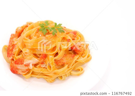 Crab-flavored tomato cream pasta with crab sticks on a light background Crab-flavored tomato cream pasta with crab sticks on a light background 116767492