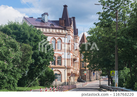 cityscape, modern street with road and bike path among historical buildings cityscape, modern street with road and bike path among historical buildings 116768220