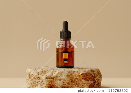 Dark amber glass bottle standing on stone. Natural skin care SPA beauty product design. Mineral organic oil cosmetics on beige background. Mock-Up. Oily pipette. Face and body treatment. Front view 116768802