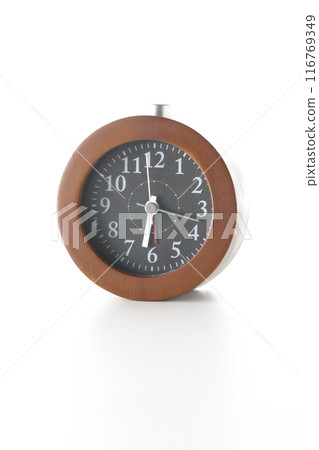 Alarm clock photographed on a white background Alarm clock photographed on a white background 116769349