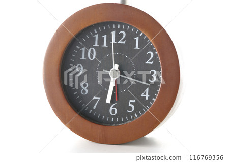 Alarm clock photographed on a white background 116769356