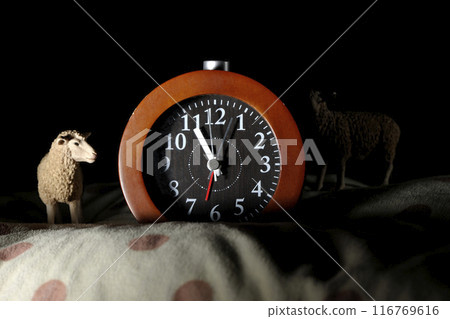 Sleep image with alarm clock and sheep 116769616
