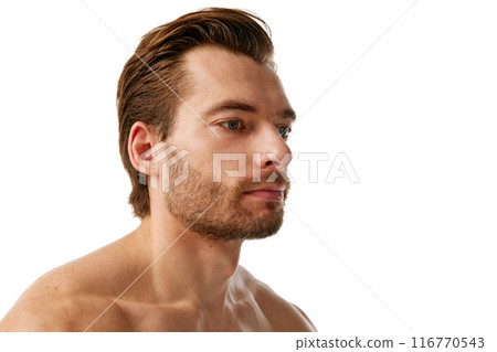 Portrait of handsome man with well-kept skin and hair, showing importance to take care after appearance isolated on white background 116770543