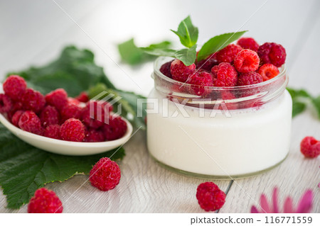 homemade food, milk yogurt with fresh raspberries 116771559