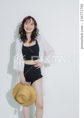 Young woman at summer resort 116771700