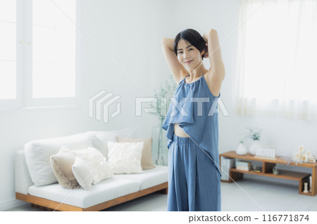 Woman in blue camisole 116771874