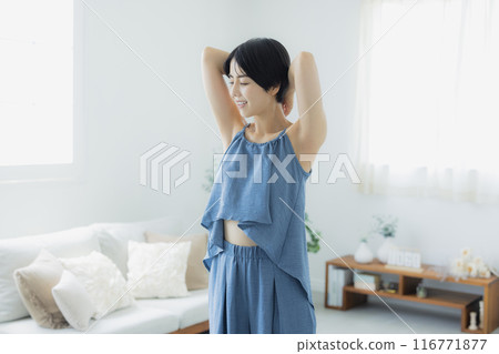 Woman in blue camisole 116771877