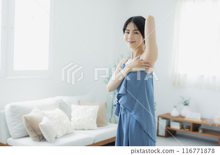 Woman in blue camisole 116771878