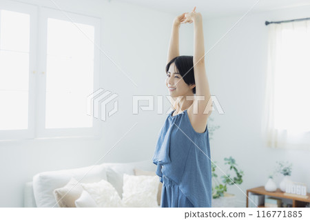Woman in blue camisole 116771885