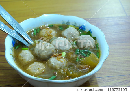 A bowl of bakso, a popular Indonesian meatball soup. A bowl of bakso, a popular Indonesian meatball soup. 116773105