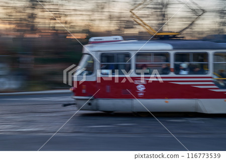 Old vintage retro tram in motion, intentionally blurred, public transportation in the streets of Prague, capital of Czech Republic 116773539