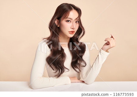 Beautiful young asian woman with clean fresh skin on beige background, Face care, Facial treatment, Cosmetology, beauty and spa, Asian women portrait. 116773593