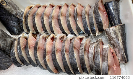Slices of mackerel fish displayed in supermarket. Fresh seafood concept Slices of mackerel fish displayed in supermarket. Fresh seafood concept 116774063