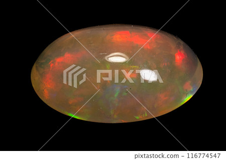 natural rainbow opal gem isolated on black background 116774547
