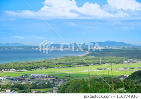 Overlooking the sea, city and blue sky from a high vantage point Overlooking the sea, city and blue sky from a high vantage point 116774930