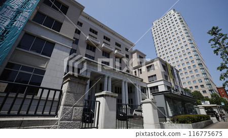 The exterior of the headquarters of Kodansha, a major general publisher. The main building is in the foreground and the high-rise building in the background is the new building. The exterior of the headquarters of Kodansha, a major general publisher. The main building is in the foreground and the high-rise building in the background is the new building. 116775675