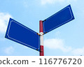 Blue road Sign with a blue sky in a background 116776720