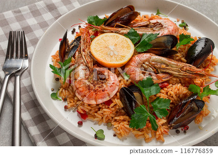 Seafood paella, shrimp and mussels risotto, rice, homemade, top view, no people, 116776859
